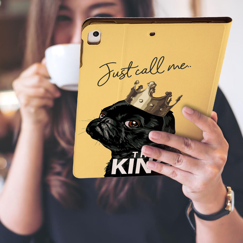 a girl is holding and viewing personalized iPad folio case with Dog Fun design