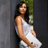 A yong girl holding personalized microsoft surface laptop case with Basketball design